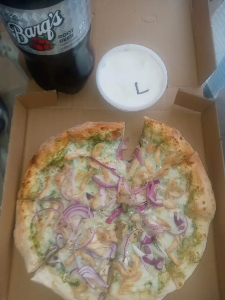 Small Pizza with Grilled Chicken and Purple Onions and Pesto Sauce as the Base